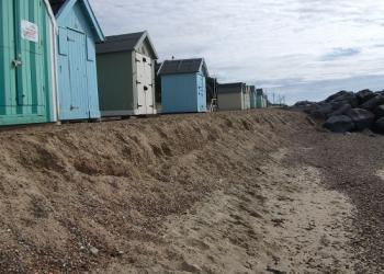 Huts in front of spa building