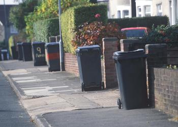 Wheelie bins on street for collection