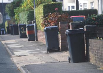 black bins out for collection on street