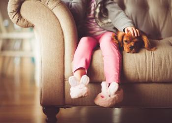 child on sofa