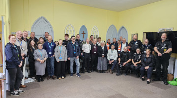 Several officers from ESC, Police and other local authorities posing for a photograph
