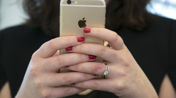 person holding an iPhone