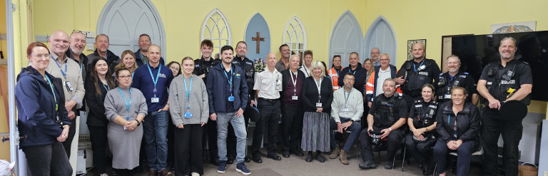 Several officers from ESC, Police and other local authorities posing for a photograph